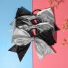imageDEEKA 12 PCS 8quot Large Glitter Cheer Bows Shiny Cheer Hair Bows Ponytail Holder Handmade for Cheerleader Girls Softball Sports BlackSilverGlitter BlackSilver