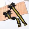 imageDEEKA 2 PCS Cheer Pin Strap Pin Me Ribbon for Backpack Glitter Cheerleader Keychain Cheer Gifts Bow HolderBlackGlitter Gold