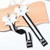 imageDEEKA 2 PCS Cheer Pin Strap Pin Me Ribbon for Backpack Glitter Cheerleader Keychain Cheer Gifts Bow HolderBlackGlitter White