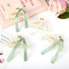 imageDEEKA Bridesmaid Proposal Gifts 8 Pack Pearl Bridesmaid Hair Claw Clips with Ribbon 3 Inch Hair Clips Bachelorette Party Favors Bridal Party Present Hair Accessories Half CircleHalf CircleWhiteGreen