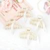 imageDEEKA Bridesmaid Proposal Gifts 8 Pack Pearl Bridesmaid Hair Claw Clips with Ribbon 3 Inch Hair Clips Bachelorette Party Favors Bridal Party Present Hair Accessories Half CircleHalf Circle Large