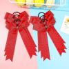 imageDEEKA 12 PCS Glitter Collegiate Style Cheer Bows Long Tail Skinny Shiny Cheer Bow Ponytail Holder Handmade Bows for Girls Teens Cheerleader Sports Light PinkRed