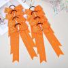 imageDEEKA 12 PCS Glitter Collegiate Style Cheer Bows Long Tail Skinny Shiny Cheer Bow Ponytail Holder Handmade Bows for Girls Teens Cheerleader Sports Light PinkOrange