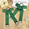 imageDEEKA 12PCS Collegiate Style Cheer Bows with Glitter Chevrons Tail Skinny College Cheerleader Ponytail Holder for Volleyball Softball Girls Hunter GreenBlackWhiteHunter GreenGlitter BlackWhite