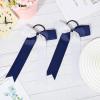 imageDEEKA 12 PCS Collegiate Style Cheer Bows Long Tail Skinny Ponytail Holder Handmade for Girls Teens Softball Cheerleader Sports RedNavy BlueWhite