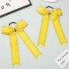 imageDEEKA Long Tail Rhinestones Cheer Bows 12 PCS Collegiate Style Full Rhinestone Skinny Ponytail Holder Handmade for Girls Teens Cheerleader Sports PurpleYellow