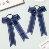 imageDEEKA Long Tail Rhinestones Cheer Bows 12 PCS Collegiate Style Full Rhinestone Skinny Ponytail Holder Handmade for Girls Teens Cheerleader Sports PurpleNavy Blue