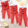 imageDEEKA Long Tail Rhinestones Cheer Bows 12 PCS Collegiate Style Full Rhinestone Skinny Ponytail Holder Handmade for Girls Teens Cheerleader Sports PurpleRed